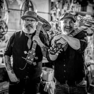 mannen met gitaar op schouder, Fatal Moutains, Duiven Fotografie